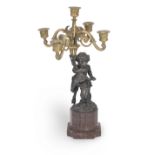 A 19th century French bronze figural four branch candlelabra