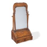 A Queen Anne walnut dressing table bureau and mirror