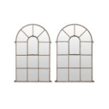 A pair of large 19th century arched wrought iron window frames (2)