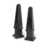 A pair of black marble obelisks (2)