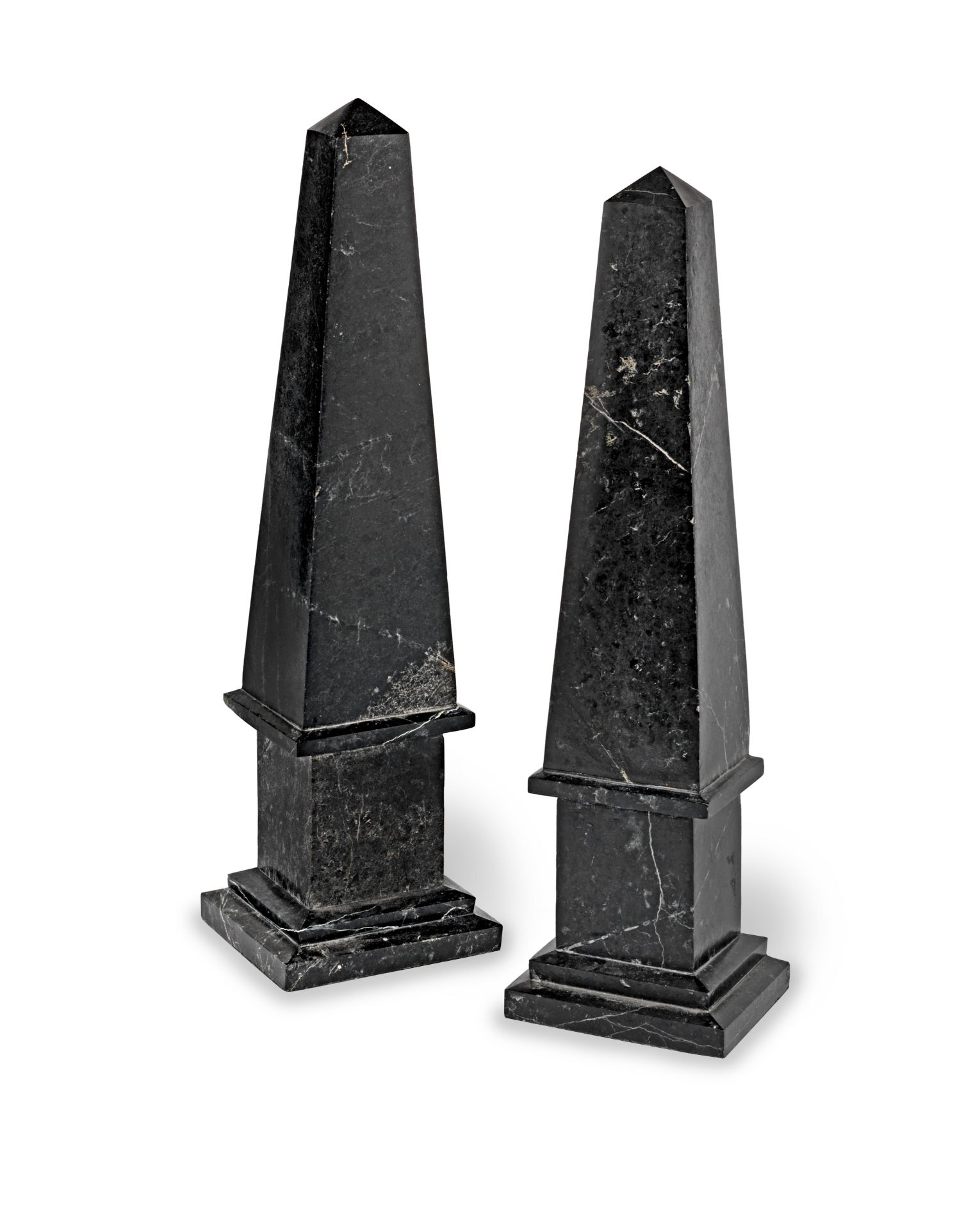 A pair of black marble obelisks (2)