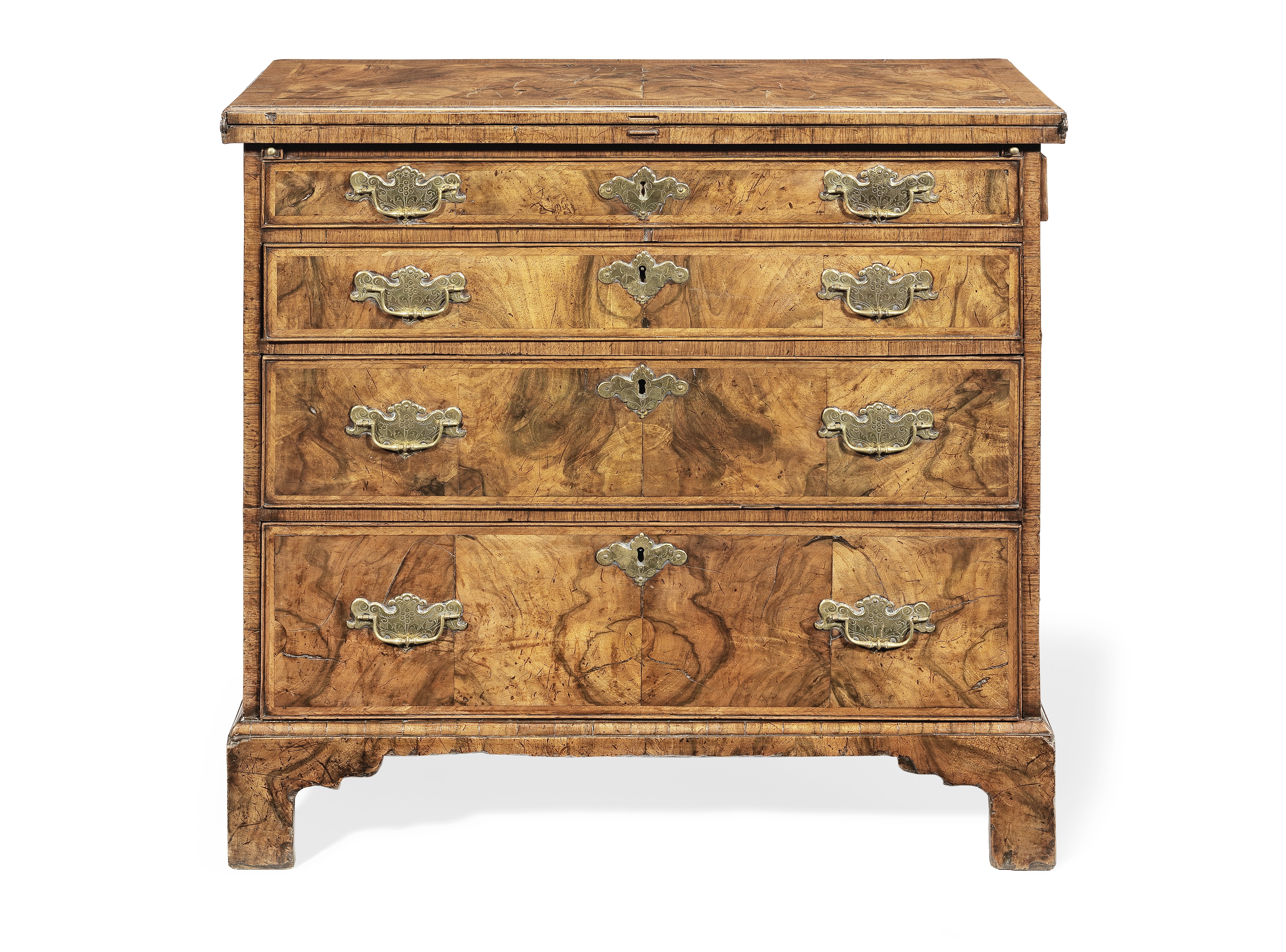 A George I walnut crossbanded and feather banded bachelor's chest