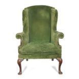 A George II chestnut wingback armchair