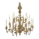 A North Italian carved gilt metal, giltwood and gesso twenty four light chandelier, 18th century...