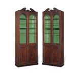 A pair of early 19th century and later mahogany bookcases (2)