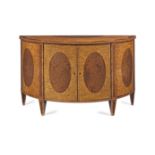 A George III thuya wood, burr elm and kingwood banded demi-lune commode