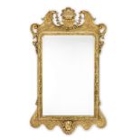 An early 20th century giltwood mirrorIn the George II style