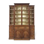 A Fine George III mahogany breakfront sectretaire bookcase