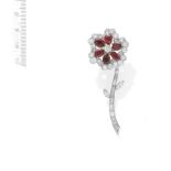 A RUBY AND DIAMOND FLOWER BROOCH, BY VAN CLEEF AND ARPELS, CIRCA 1960