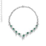 AN EMERALD AND DIAMOND NECKLACE, BY GÜBELIN,