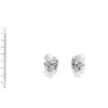 A PAIR OF CULTURED PEARL AND DIAMOND EARCLIPS, BY MEISTER