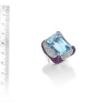 AN AQUAMARINE, RUBY AND DIAMOND DRESS RING, BY MARGHERITA BURGENER