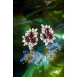 A FINE PAIR OF RUBY AND DIAMOND EARRINGS