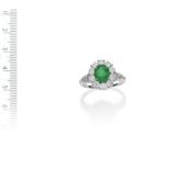 AN EMERALD AND DIAMOND RING, BY VAN CLEEF AND ARPELS