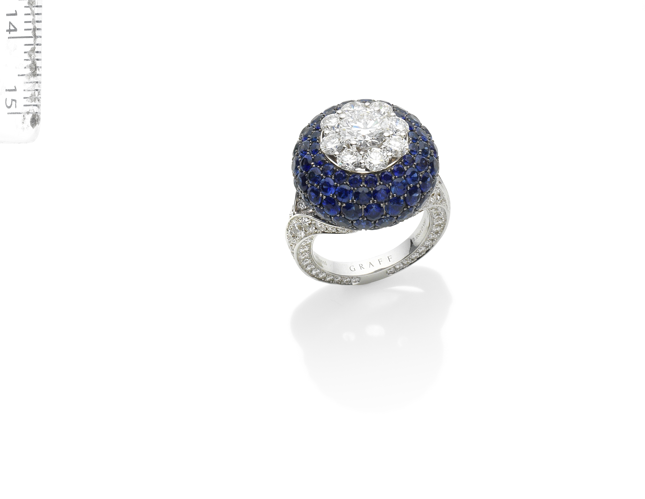A SAPPHIRE AND DIAMOND 'HALO' RING, BY GRAFF