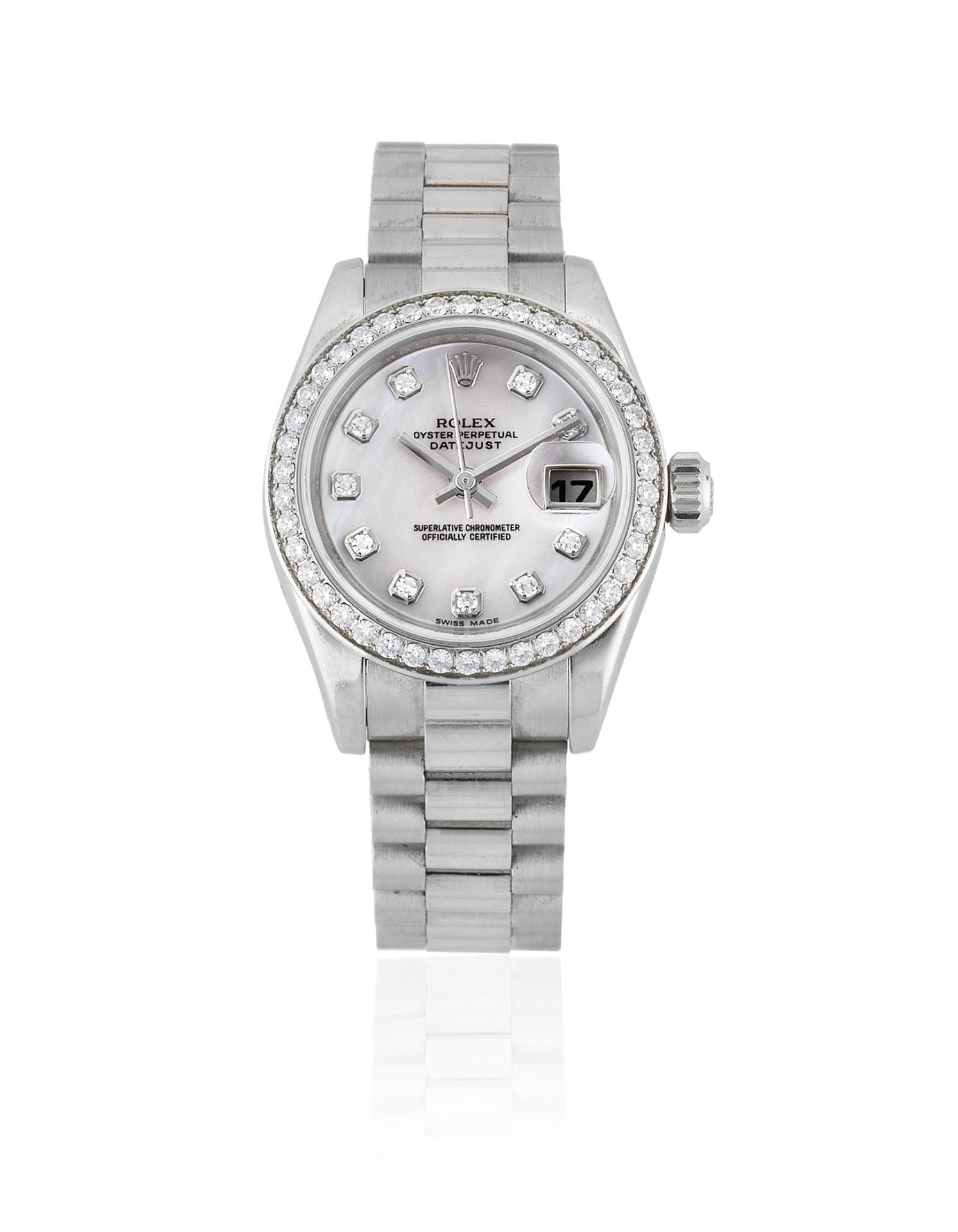 Rolex. A lady's platinum and diamond set automatic calendar bracelet watch with mother of pearl d...