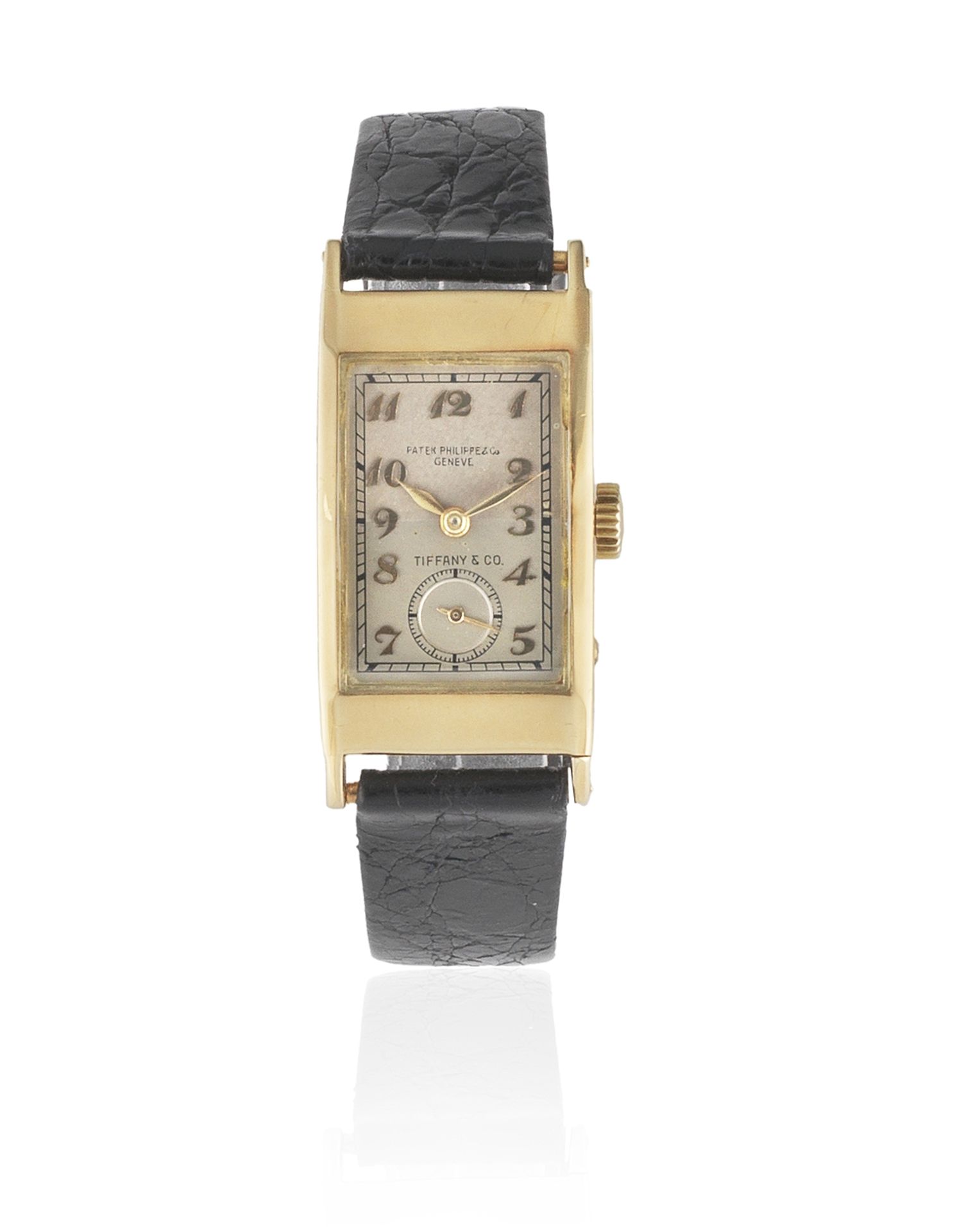 Patek, Philippe & Co, Geneve. A rare double signed 18K gold manual wind rectangular wristwatch re...