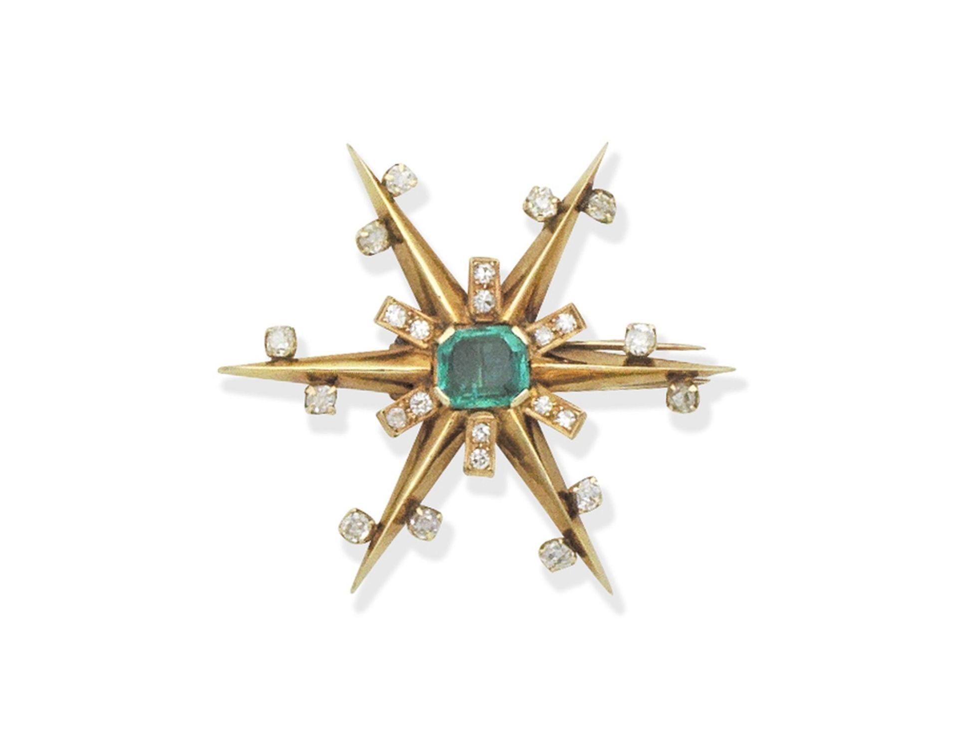 Emerald and diamond star brooch, circa 1950