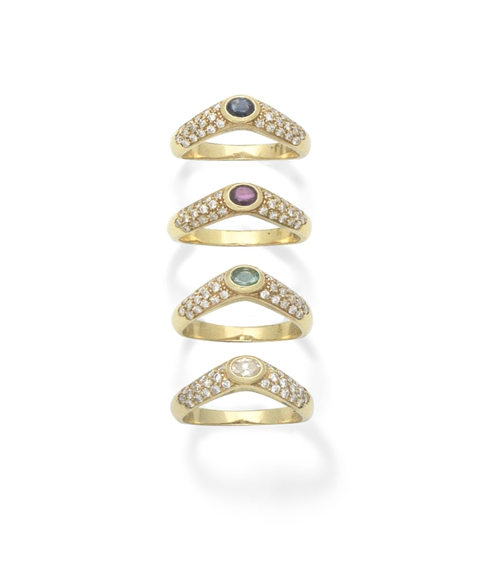 Four gem-set rings