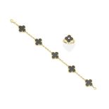 Van Cleef & Arpels: 'Alhambra' onyx bracelet and ring suite