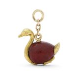 A miniature gold-mounted purpurine swan egg pendant Fabergé, workmaster Mikhail Perkhin