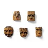 Vladimir Piatnitsky (1938-1978) A group of five carved and painted wooden masks height of largest...