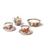 A Soviet porcelain tea set with lubok-inspired decorationLomonosov Porcelain Factory, after a des...