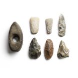 A group of four Palaeolithic and three Neolithic stone and flint implements 7