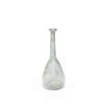 A Roman pale green glass flask