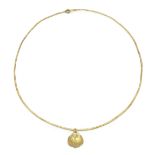An Egyptian gold necklace with gold oyster shell pendant