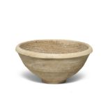 A large Mesopotamian pottery incantation bowl