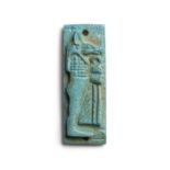 An Egyptian turquoise glazed composition plaque of Duamutef