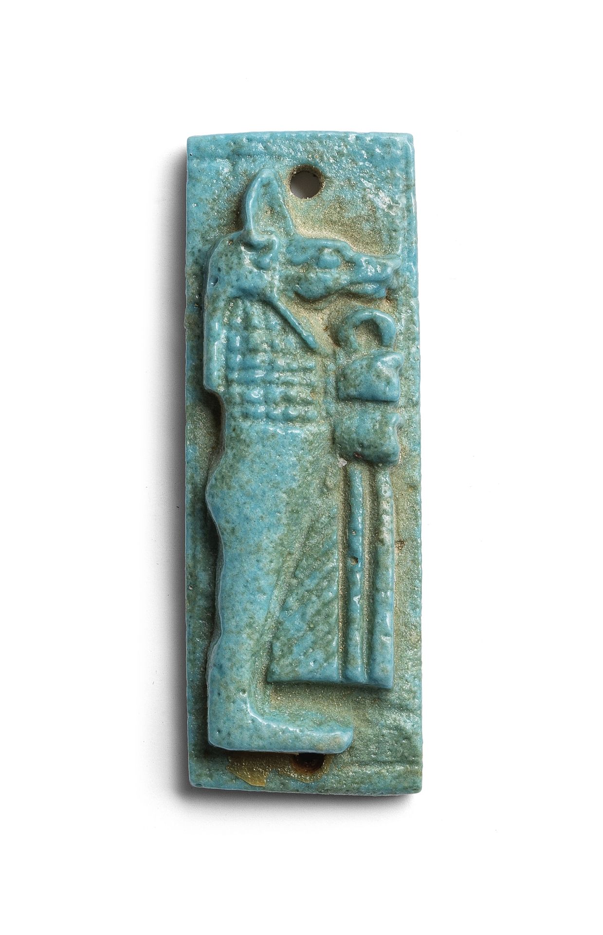 An Egyptian turquoise glazed composition plaque of Duamutef