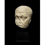 A Roman marble portrait head fragment