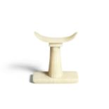 An Egyptian alabaster headrest