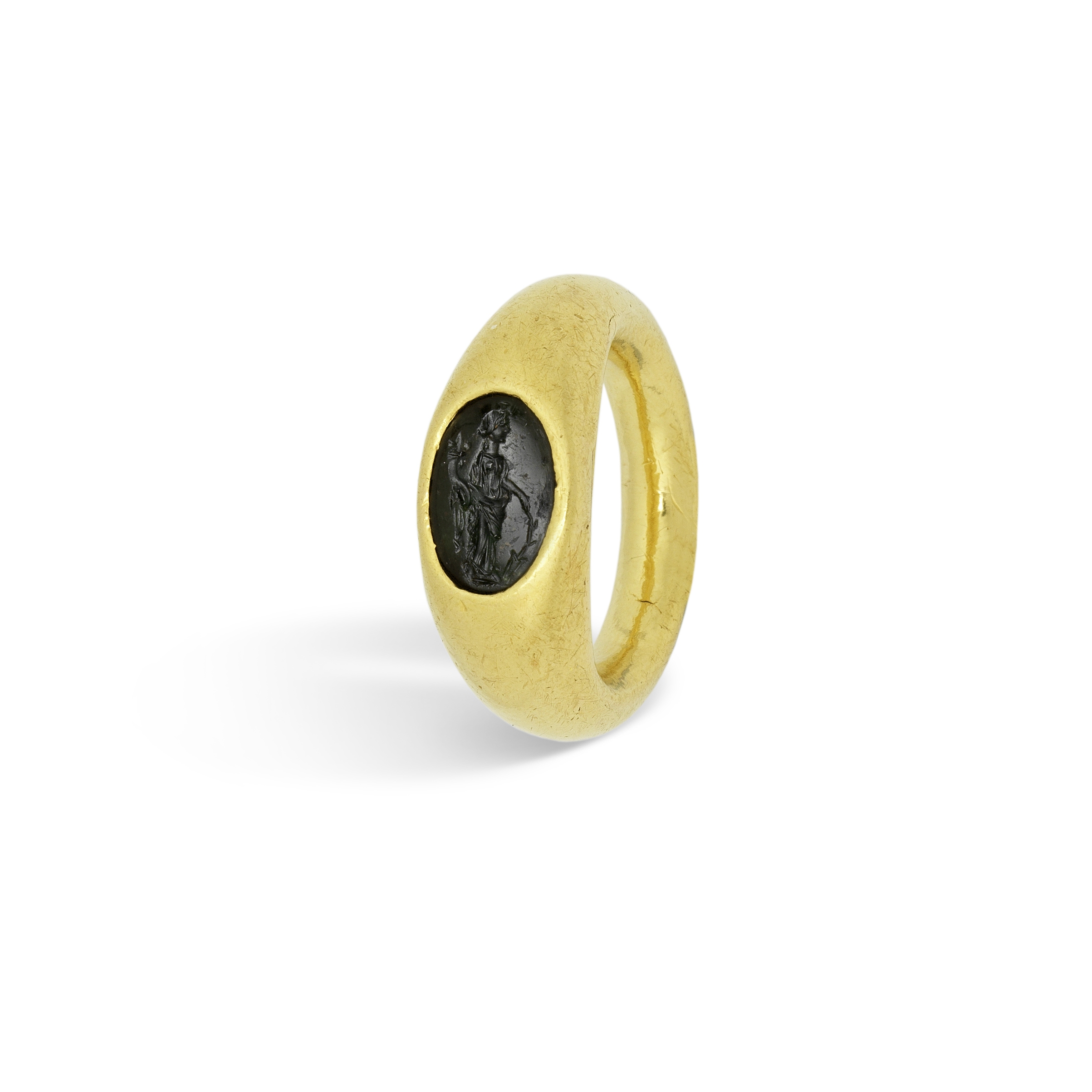 A Roman gold ring with green plasma intaglio of Fortuna