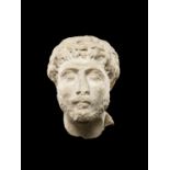 A Roman marble male portrait head