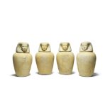 A set of four Egyptian limestone canopic jars