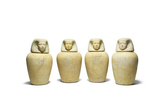 A set of four Egyptian limestone canopic jars