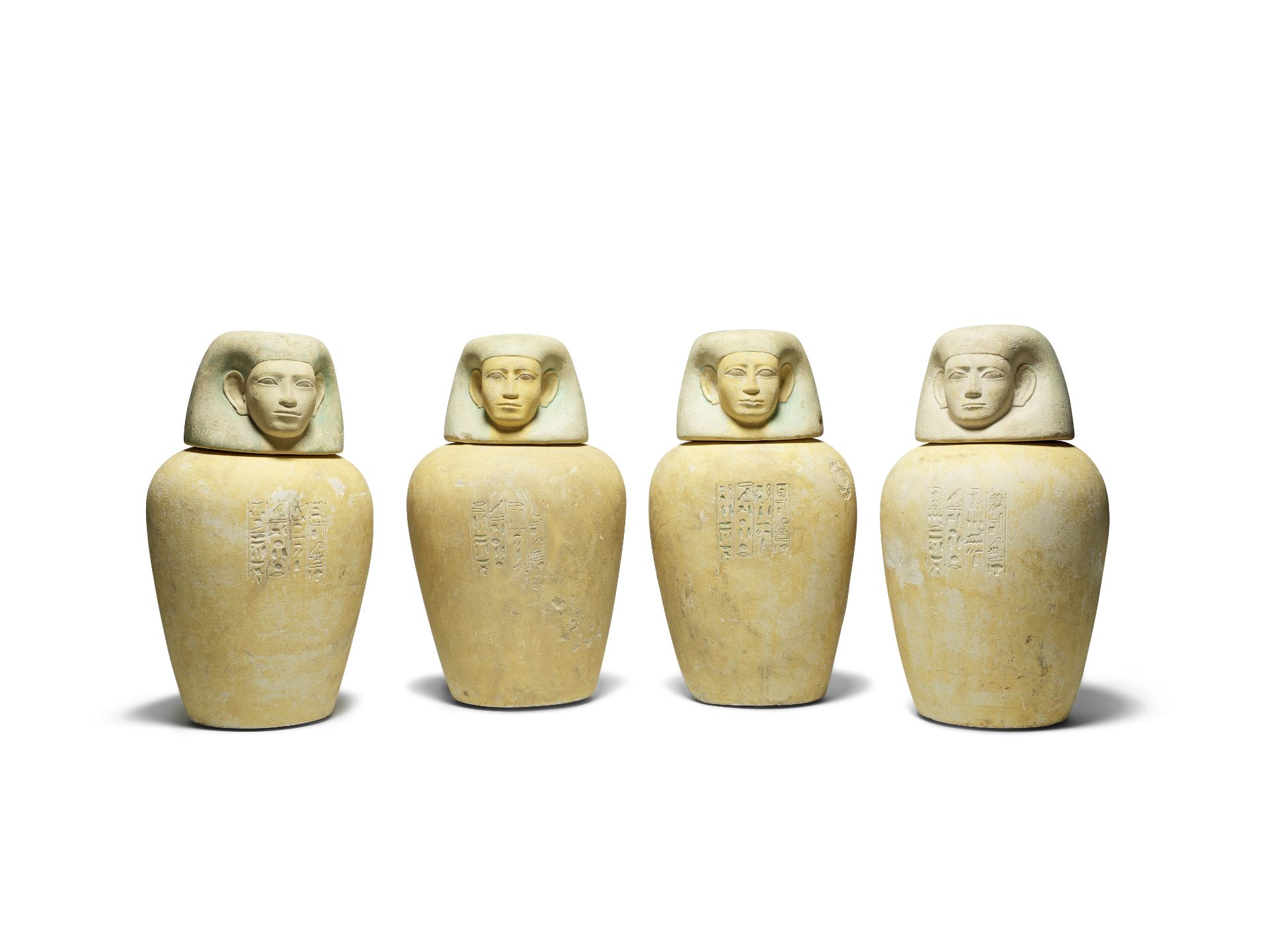 A set of four Egyptian limestone canopic jars