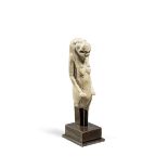 An Egyptian indurated limestone figure of Taweret