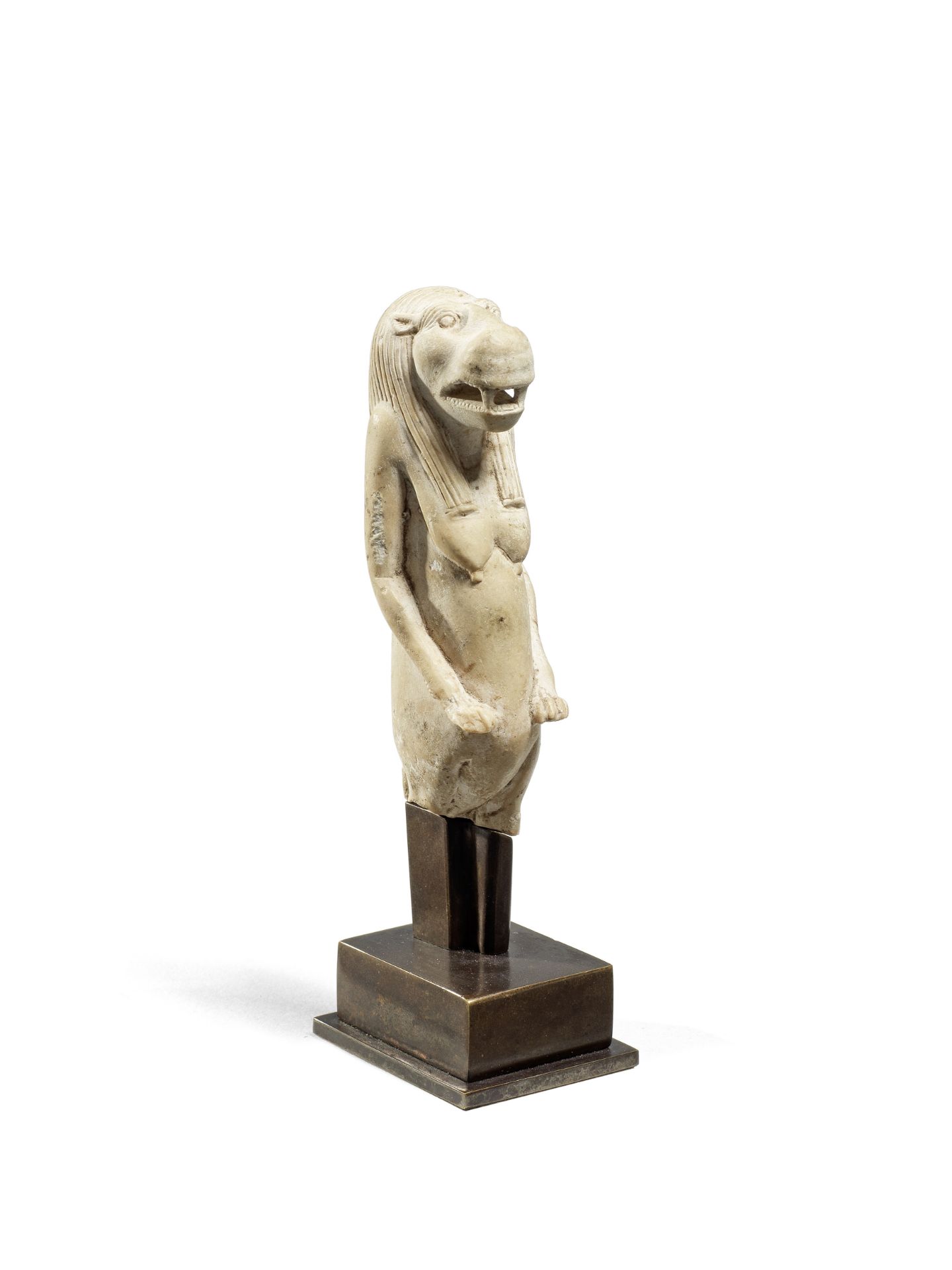 An Egyptian indurated limestone figure of Taweret