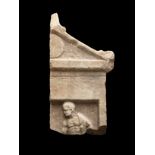 A Greek marble stele fragment