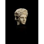 A Roman marble head of Dionysus