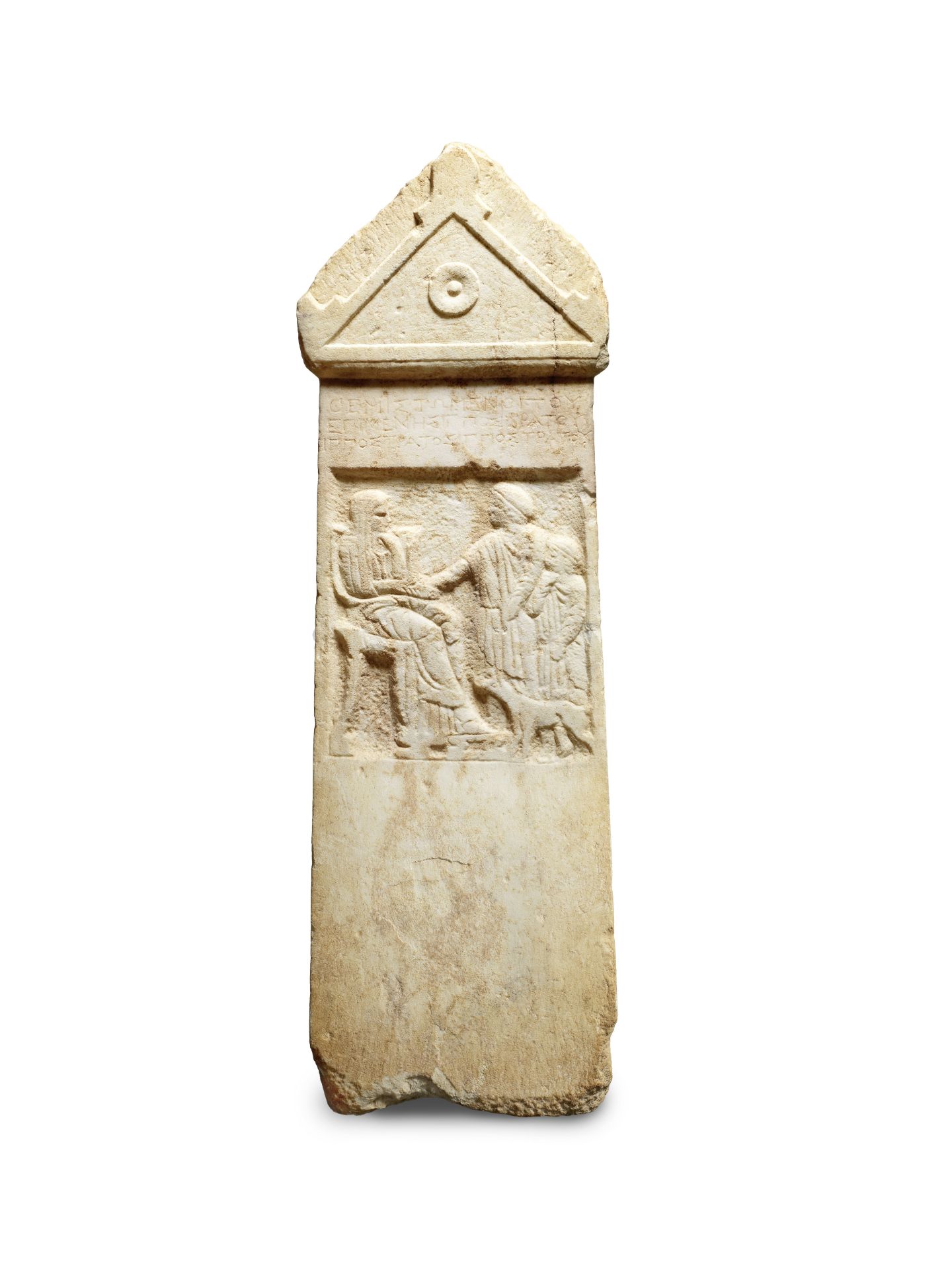 A Greek marble funerary stele