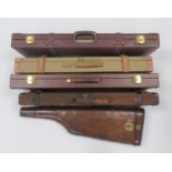 Four assorted guncases and a leather leg-of-mutton