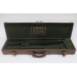 A single brass-mounted leather gun case, by William Evans