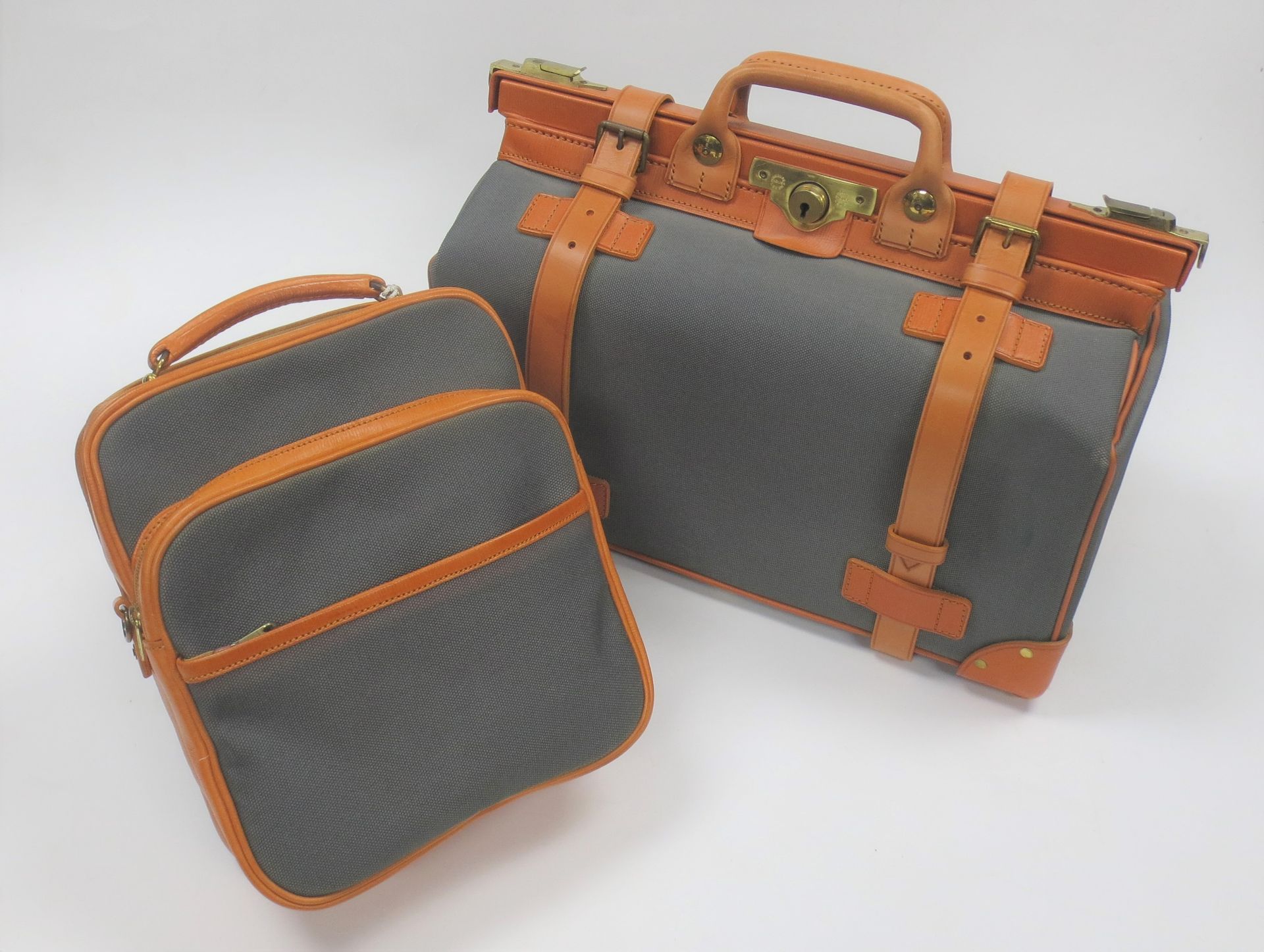 A leather and canvas Gladstone-bag by Tanner Krolle, retailed by Fortnum & Mason