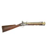 A Brass-Barrelled Flintlock Blunderbuss With Spring Bayonet