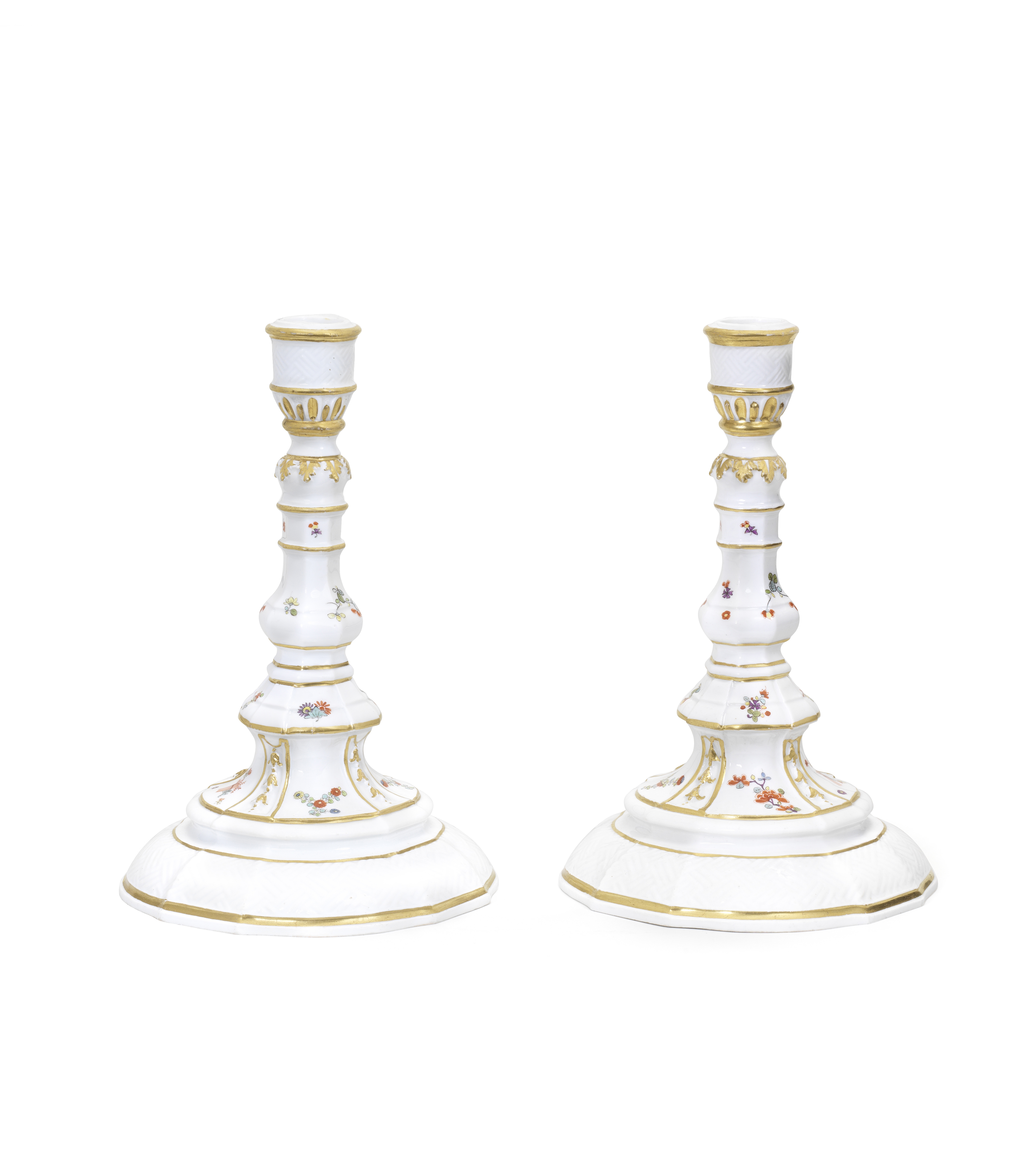 A pair of Meissen candlesticks, circa 1735-39